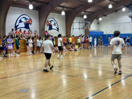 Students playing dodgeball in the Varsity Gym