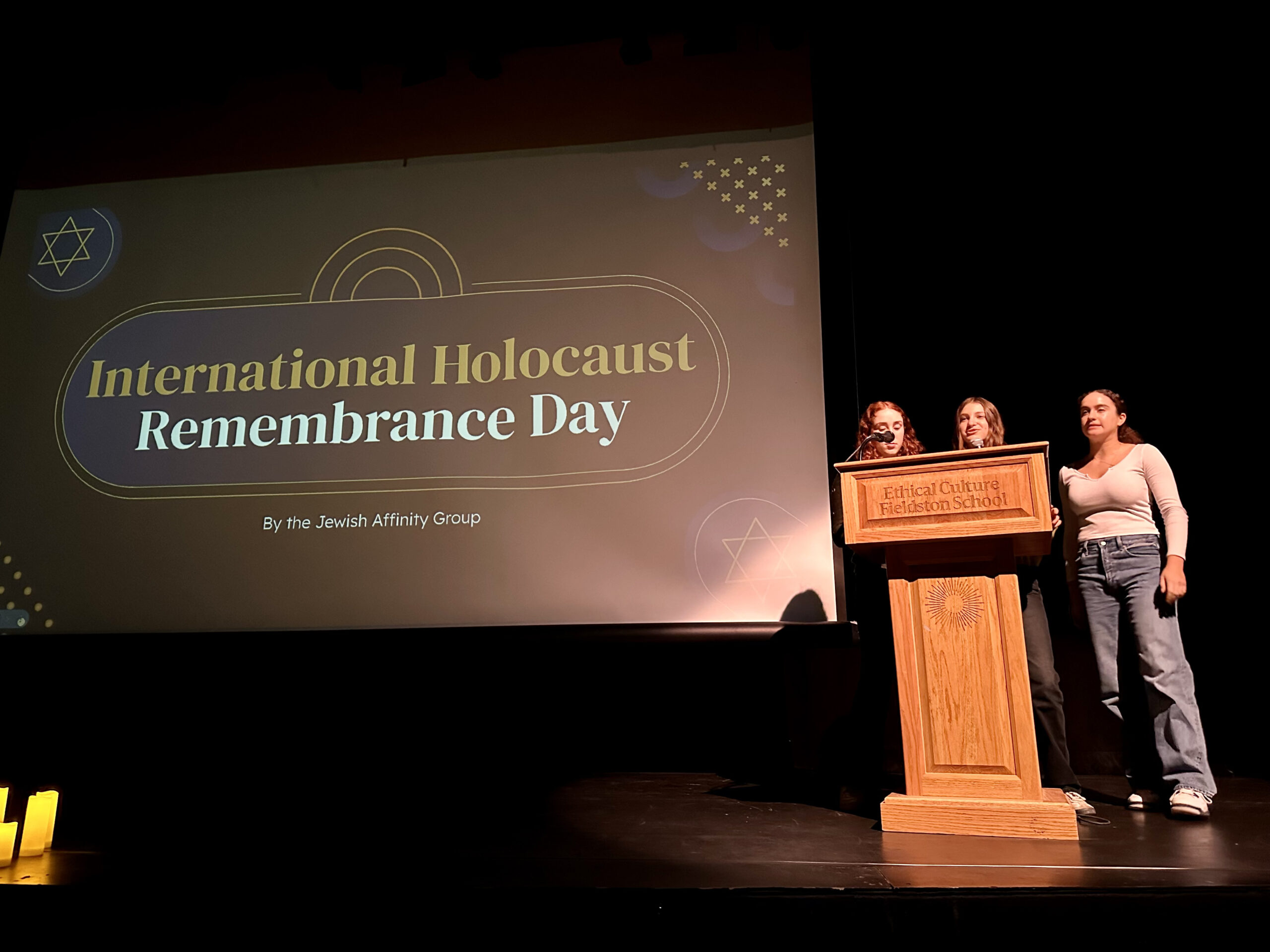 Members of the student Jewish Affinity Group give assembly presentation on International Holocaust Remembrance Day.