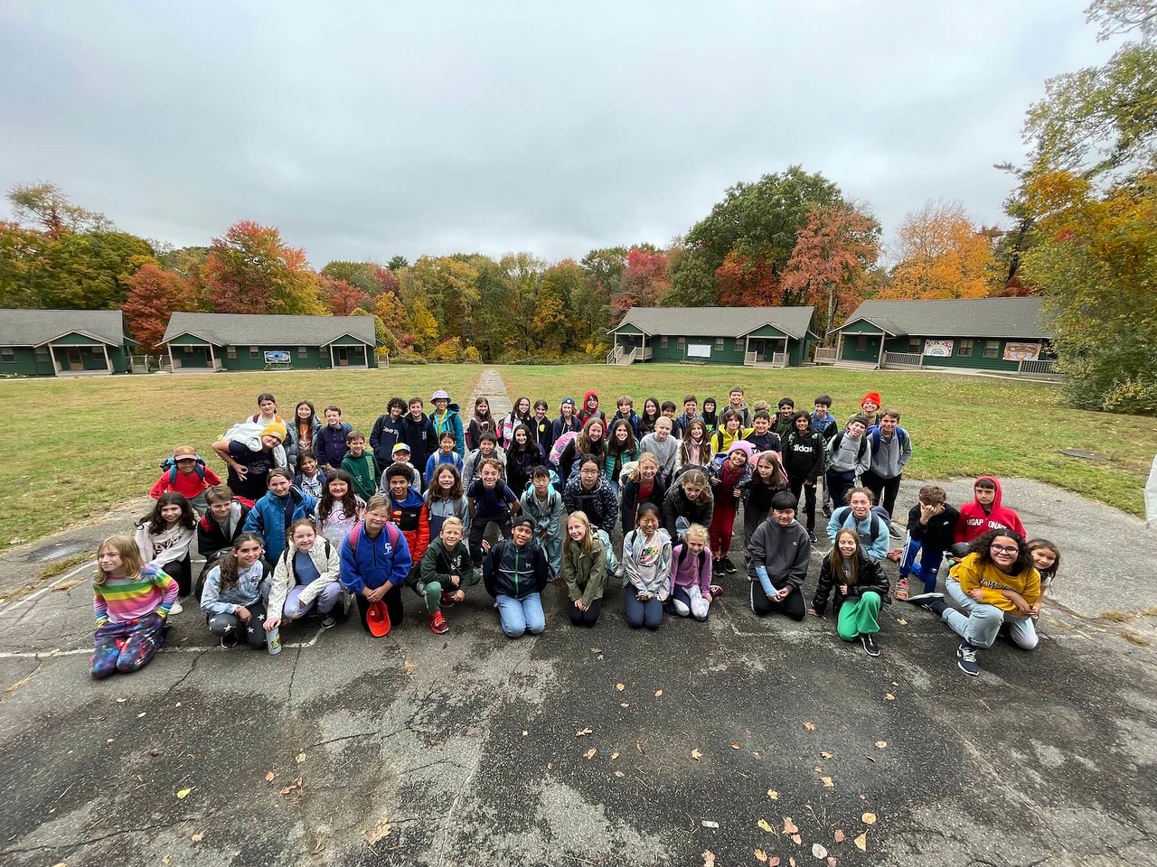 Ethical Culture 5th Graders gather for group photo outdoors at Nature's Classroom.