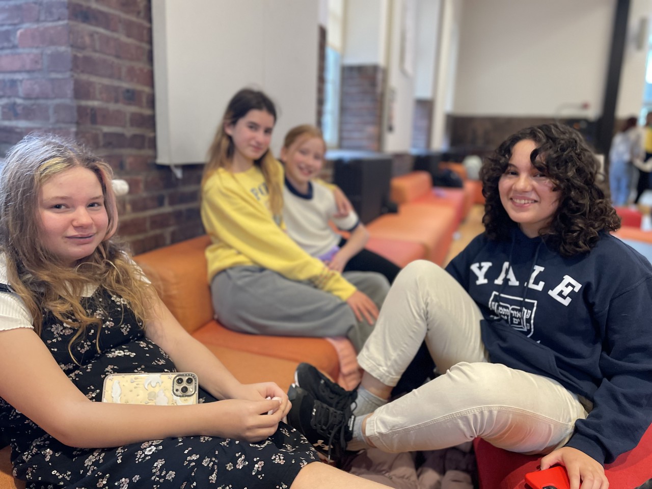 Fieldston Middle students pose together in Student Commons at Middle School social.