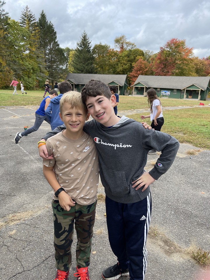 Two Ethical Culture students pose outside at Nature's Classroom.