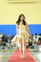 An Ethical Culture Fieldston Upper School student models at the Fashion Show.