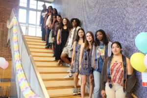 Fieldston Upper Bridge to Bridge seniors pose on Dining Hall staircase.