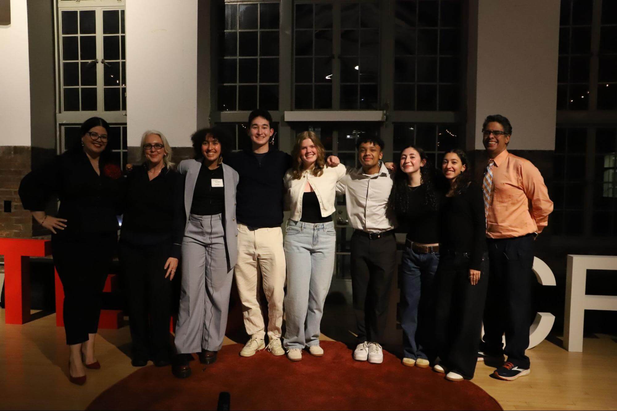 A group photo of student and faculty speakers at the TEDxECFS event