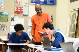 English Department Chair Alwin Jones speaks to students in a classroom.