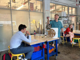 Ethical Culture Fieldston School students sit in an engineering class.