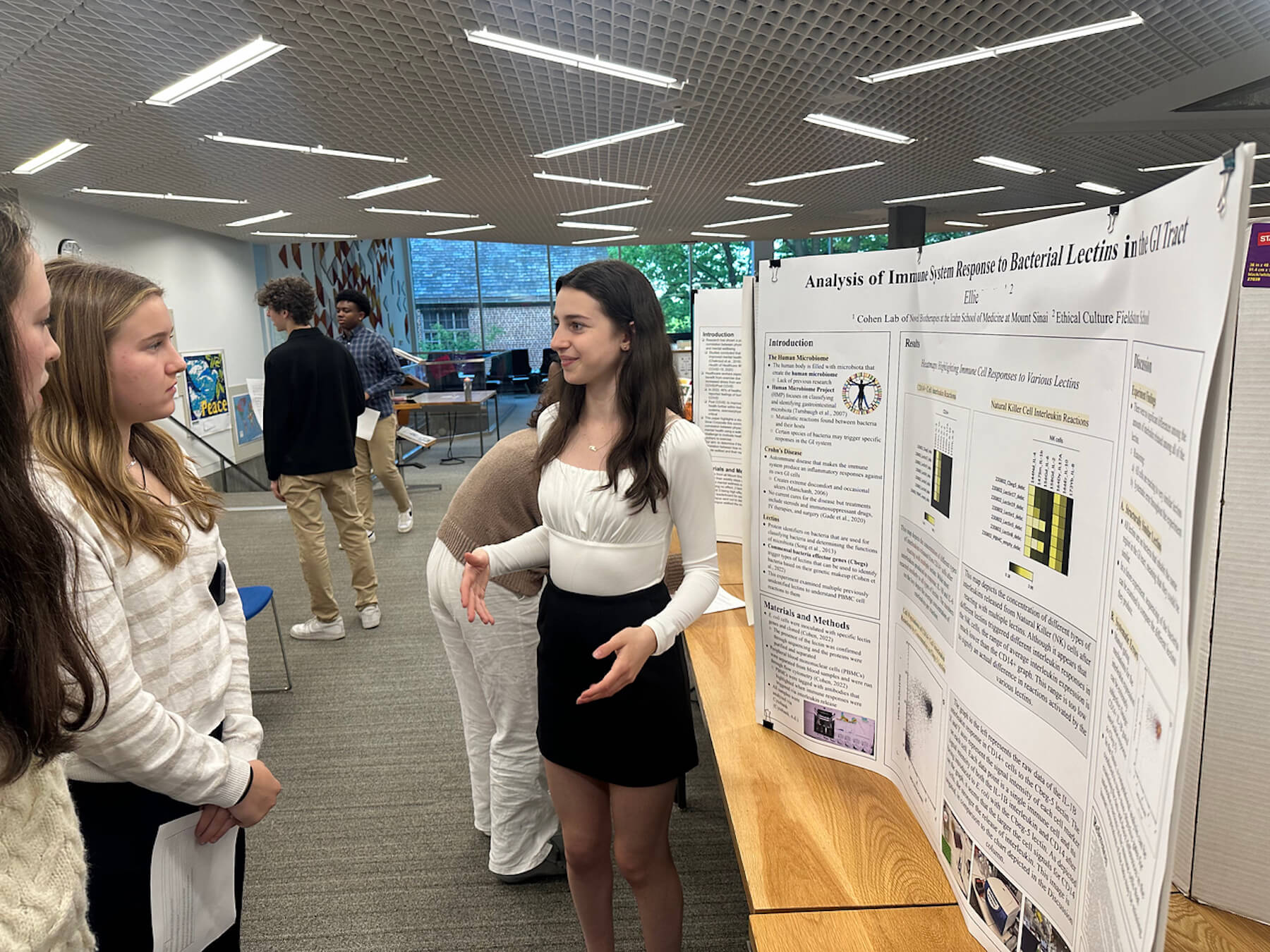 An Ethical Culture Fieldston School student speaks at science research event.